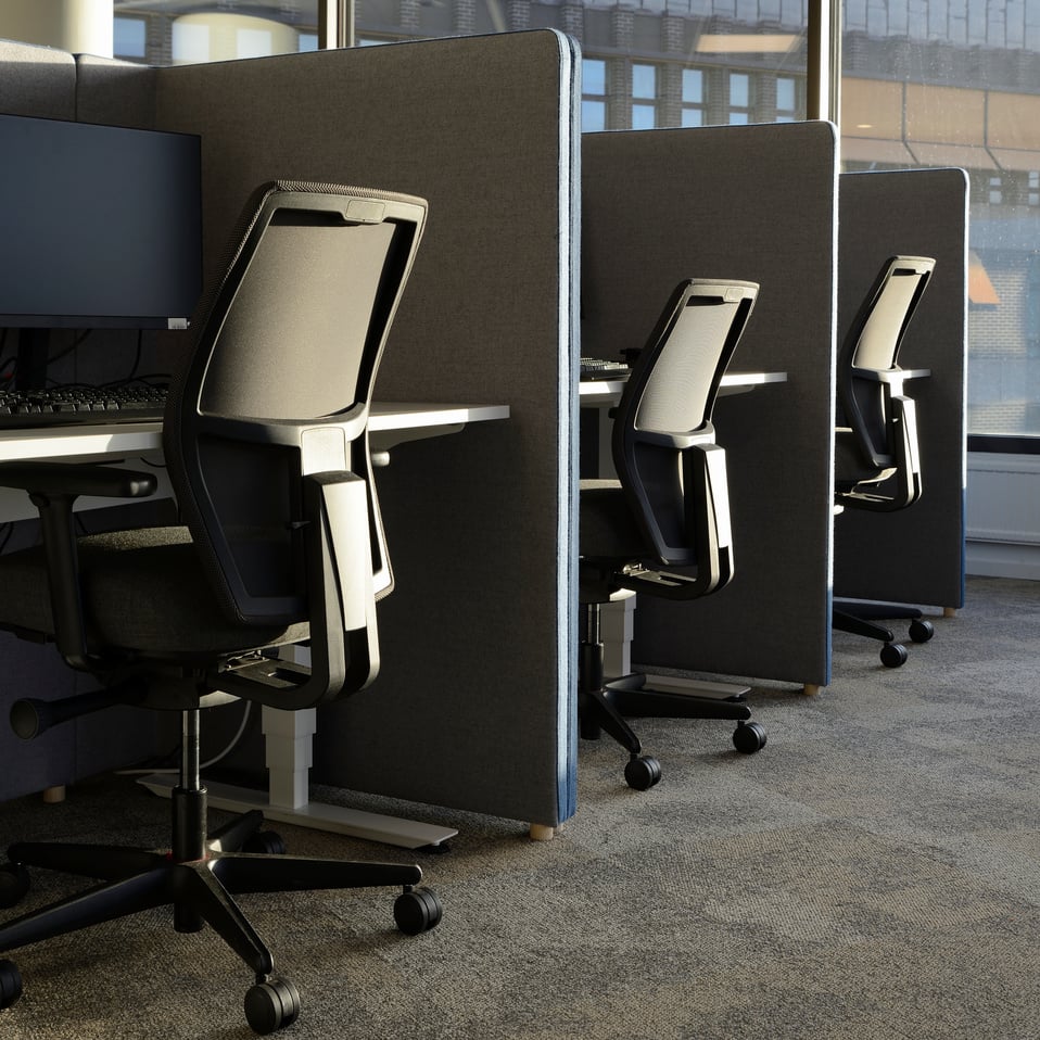 Empty office chairs in a row